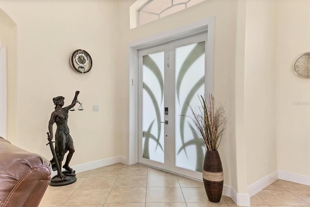 1402 SW 4th Ln, Cape Coral, FL 33991 - foyer entrance featuring french doors and light tile patterned flooring