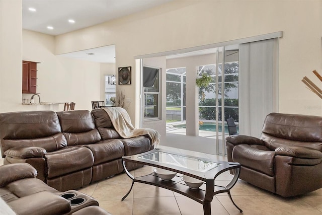 1402 SW 4th Ln, Cape Coral, FL 33991 - living room with light tile patterned floors and recessed lighting