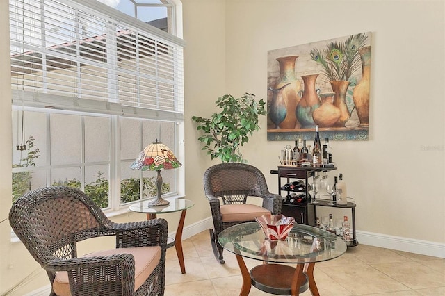 1402 SW 4th Ln, Cape Coral, FL 33991 - living area featuring plenty of natural light and tile patterned flooring