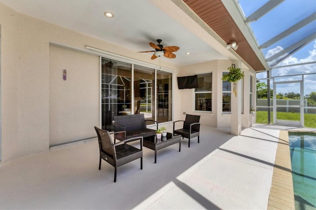 1402 SW 4th Ln, Cape Coral, FL 33991 - view of patio with ceiling fan, glass enclosure, an outdoor pool, and outdoor lounge area