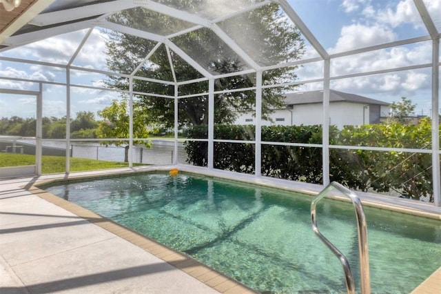 1402 SW 4th Ln, Cape Coral, FL 33991 - outdoor pool with glass enclosure and a patio