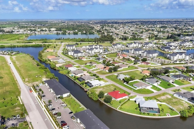 1402 SW 4th Ln, Cape Coral, FL 33991 - aerial perspective of suburban area featuring a large body of water
