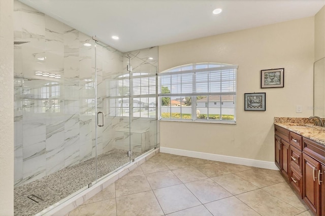 1402 SW 4th Ln, Cape Coral, FL 33991 - bathroom with vanity, a marble finish shower, recessed lighting, and tile patterned flooring