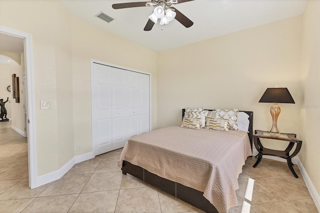 1402 SW 4th Ln, Cape Coral, FL 33991 - bedroom featuring light tile patterned floors, a closet, ceiling fan, and arched walkways
