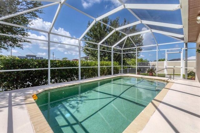 1402 SW 4th Ln, Cape Coral, FL 33991 - view of swimming pool featuring a lanai and a patio area