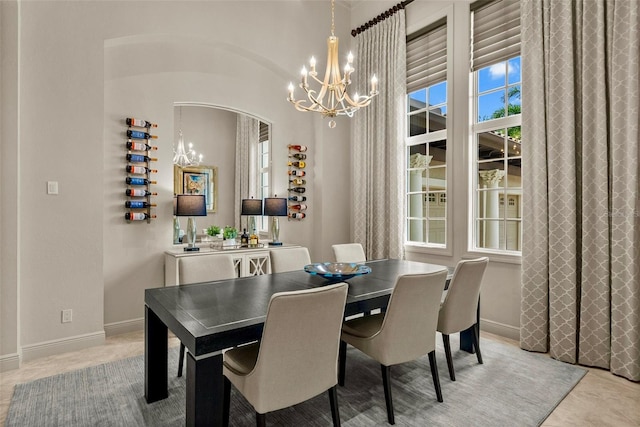 6926 Lacantera Cir, Lakewood Ranch, FL 34202 - dining room with a chandelier and baseboards