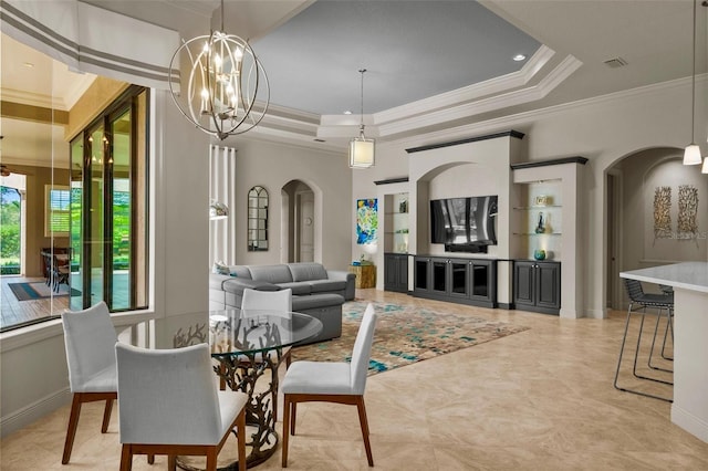 6926 Lacantera Cir, Lakewood Ranch, FL 34202 - dining space featuring arched walkways, crown molding, a tray ceiling, a chandelier, and recessed lighting