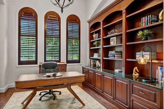 6926 Lacantera Cir, Lakewood Ranch, FL 34202 - home office with dark wood-style flooring