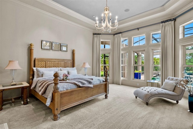6926 Lacantera Cir, Lakewood Ranch, FL 34202 - carpeted bedroom featuring a chandelier, ornamental molding, and a raised ceiling
