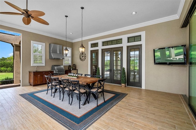 6926 Lacantera Cir, Lakewood Ranch, FL 34202 - dining area featuring crown molding, french doors, light wood-type flooring, ceiling fan, and recessed lighting