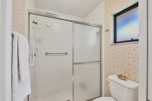 3557 Wilkinson Woods Dr, Sarasota, FL 34231 - bathroom with a stall shower and wallpapered walls