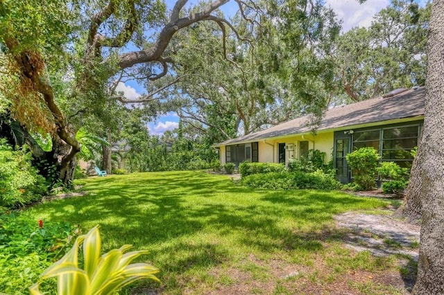 3557 Wilkinson Woods Dr, Sarasota, FL 34231 - view of grassy yard