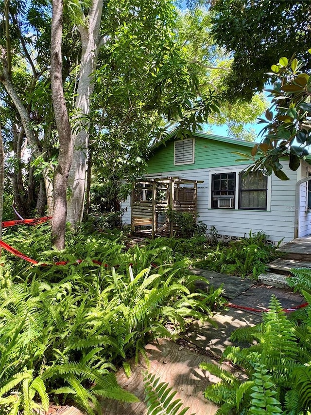 1109 Patterson Dr, Sarasota, FL 34234 - view of front of home featuring cooling unit