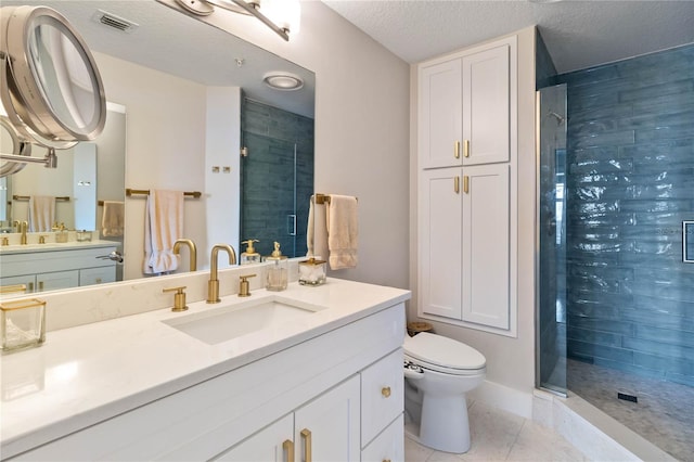 750 N Tamiami Trl Unit 1616, Sarasota, FL 34236 - full bathroom with a stall shower, vanity, and tile patterned flooring