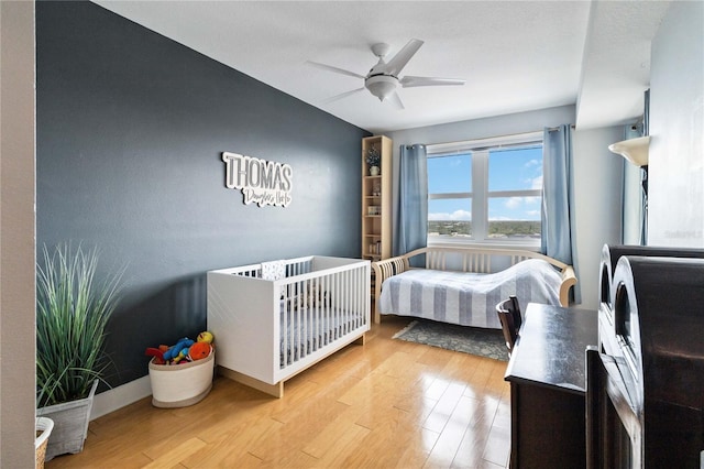 750 N Tamiami Trl Unit 1616, Sarasota, FL 34236 - bedroom featuring wood finished floors and a ceiling fan
