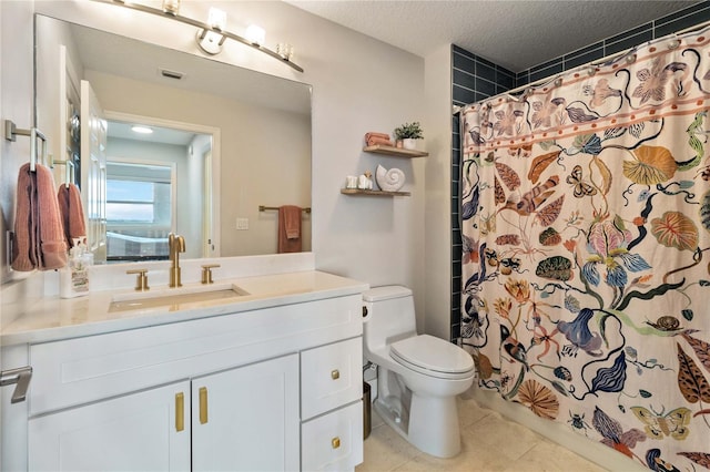 750 N Tamiami Trl Unit 1616, Sarasota, FL 34236 - full bath featuring vanity, a shower with curtain, tile patterned flooring, and a textured ceiling