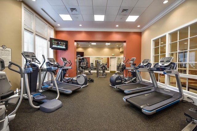 750 N Tamiami Trl Unit 1616, Sarasota, FL 34236 - exercise room featuring a drop ceiling and crown molding