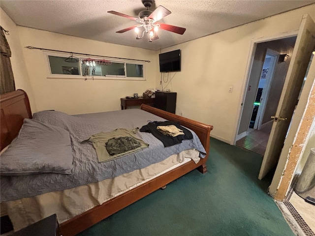 12345 Terra Ceia Ave, New Port Richey, FL 34654 - bedroom featuring a textured ceiling, carpet, and ceiling fan