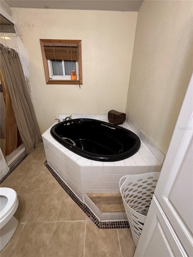12345 Terra Ceia Ave, New Port Richey, FL 34654 - bathroom featuring a whirlpool tub, a shower with shower curtain, and tile patterned floors