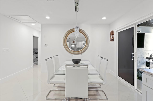 6917 22nd St W, Bradenton, FL 34207 - dining area with light tile patterned floors and recessed lighting