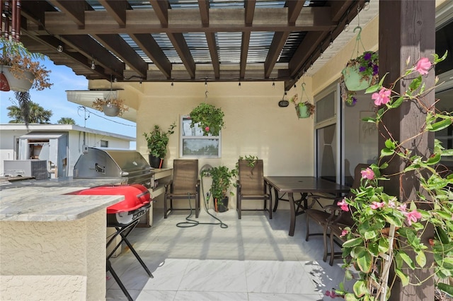 6917 22nd St W, Bradenton, FL 34207 - view of patio with an outdoor kitchen, a pergola, and a bar