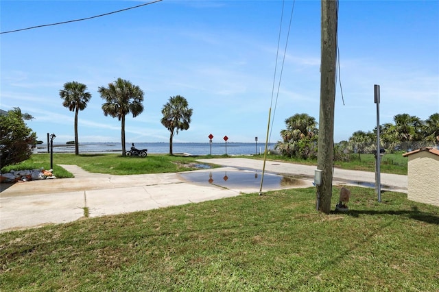 6917 22nd St W, Bradenton, FL 34207 - view of green lawn featuring a water view