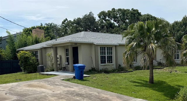 201 8th St NE Unit 201 203, Ruskin, FL 33570 - single story home featuring stucco siding and a chimney