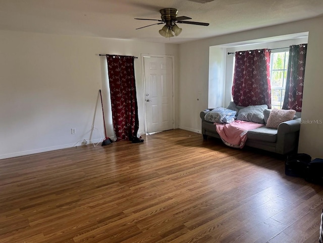 201 8th St NE Unit 201 203, Ruskin, FL 33570 - living room featuring wood finished floors and a ceiling fan