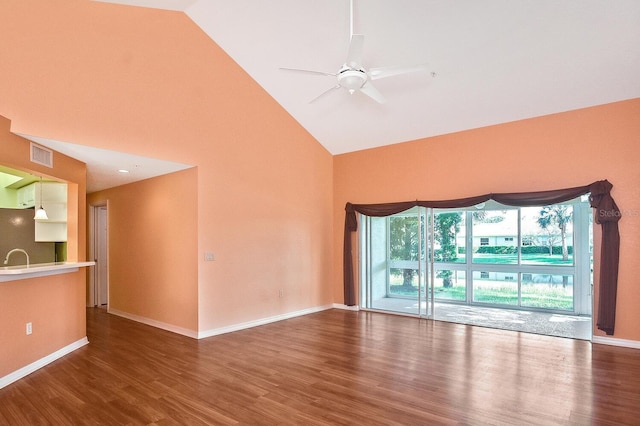 7605 Sweetbay Cir Unit 5-102, Bradenton, FL 34203 - unfurnished room with high vaulted ceiling, wood finished floors, and ceiling fan