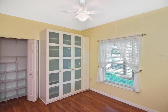 7605 Sweetbay Cir Unit 5-102, Bradenton, FL 34203 - unfurnished room featuring dark wood-style floors and a ceiling fan