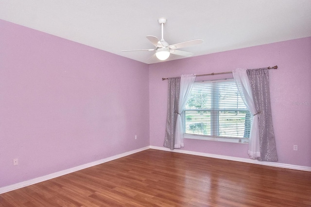 7605 Sweetbay Cir Unit 5-102, Bradenton, FL 34203 - spare room featuring wood finished floors and ceiling fan
