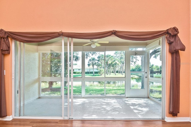 7605 Sweetbay Cir Unit 5-102, Bradenton, FL 34203 - entryway featuring wood finished floors, a ceiling fan, and a water view