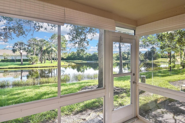 7605 Sweetbay Cir Unit 5-102, Bradenton, FL 34203 - unfurnished sunroom featuring a water view