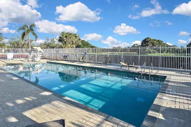 7605 Sweetbay Cir Unit 5-102, Bradenton, FL 34203 - community pool featuring a patio