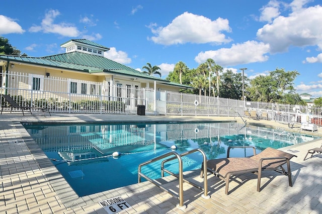 7605 Sweetbay Cir Unit 5-102, Bradenton, FL 34203 - community pool featuring a patio