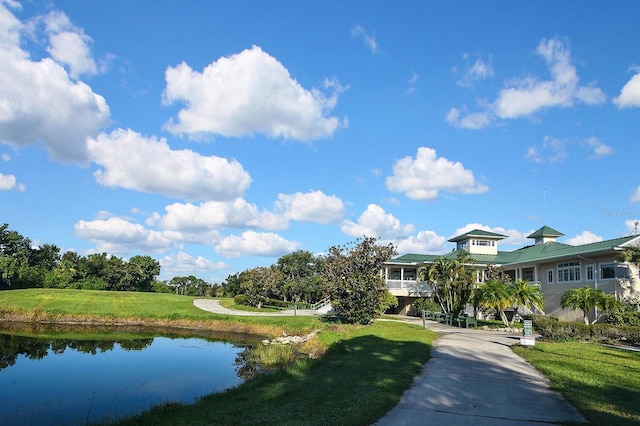 7605 Sweetbay Cir Unit 5-102, Bradenton, FL 34203 - view of community with a water view and a lawn