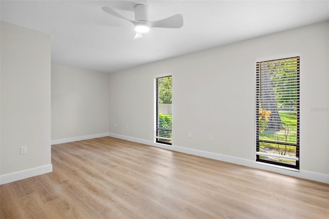 3518 Wilkinson Woods Dr Unit 11, Sarasota, FL 34231 - unfurnished room with light wood-type flooring and a ceiling fan