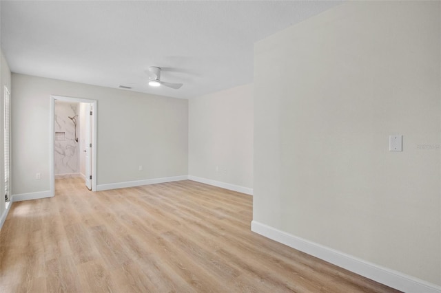3518 Wilkinson Woods Dr Unit 11, Sarasota, FL 34231 - empty room with ceiling fan and light wood-type flooring