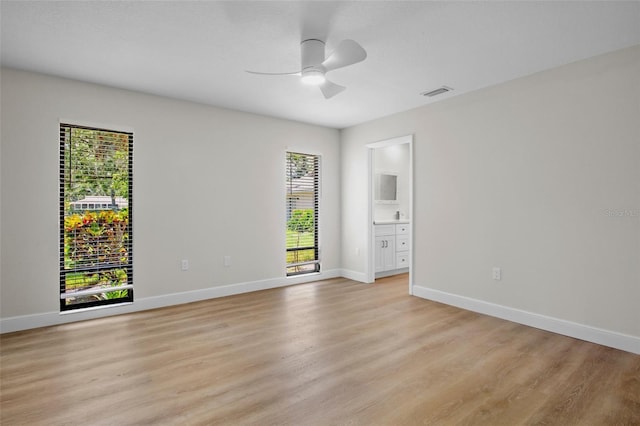 3518 Wilkinson Woods Dr Unit 11, Sarasota, FL 34231 - spare room with light wood finished floors and a ceiling fan