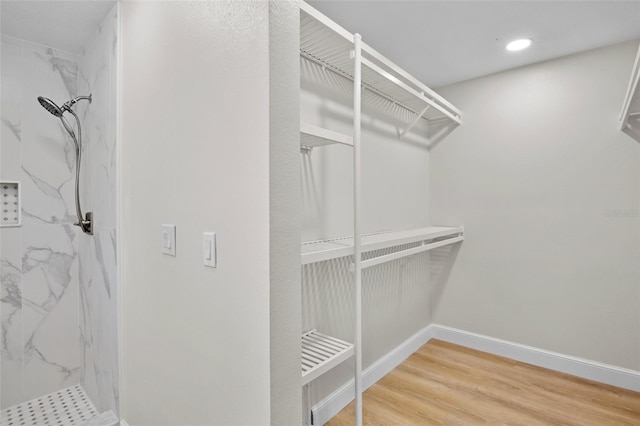 3518 Wilkinson Woods Dr Unit 11, Sarasota, FL 34231 - spacious closet featuring wood finished floors
