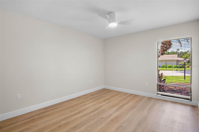 3518 Wilkinson Woods Dr Unit 11, Sarasota, FL 34231 - empty room with light wood-type flooring and ceiling fan