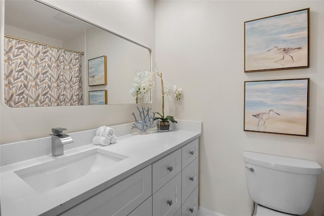 3518 Wilkinson Woods Dr Unit 11, Sarasota, FL 34231 - bathroom featuring vanity and toilet