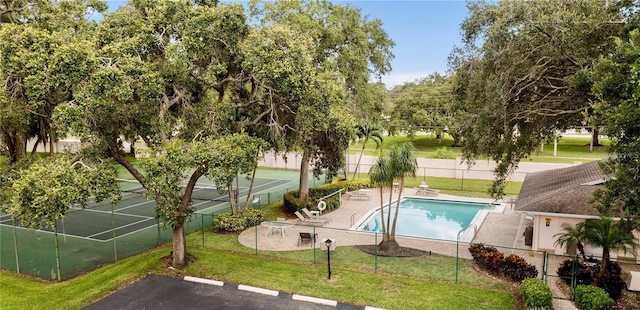 3518 Wilkinson Woods Dr Unit 11, Sarasota, FL 34231 - community pool with a tennis court and a patio