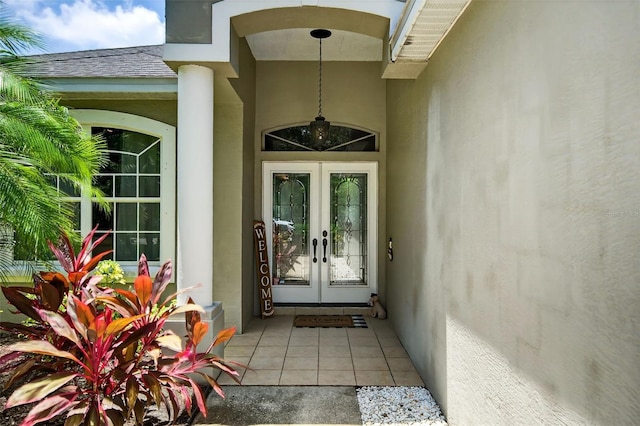 4668 73rd St E, Bradenton, FL 34203 - doorway to property with french doors and stucco siding