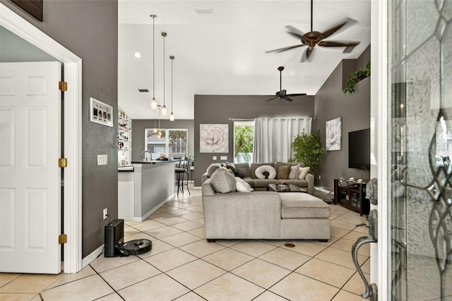 4668 73rd St E, Bradenton, FL 34203 - living room with a ceiling fan, high vaulted ceiling, and light tile patterned floors