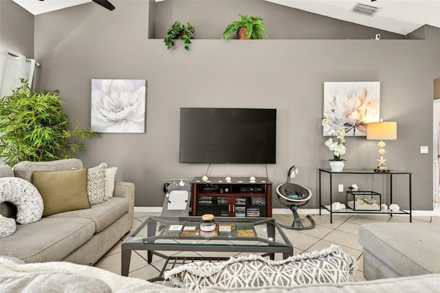 4668 73rd St E, Bradenton, FL 34203 - tiled living room with ceiling fan and vaulted ceiling