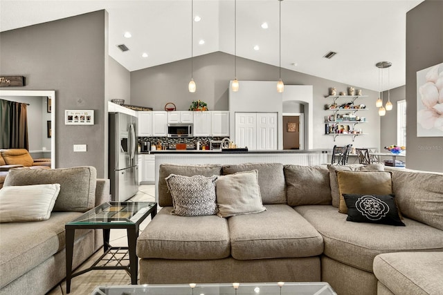 4668 73rd St E, Bradenton, FL 34203 - living room with high vaulted ceiling and arched walkways