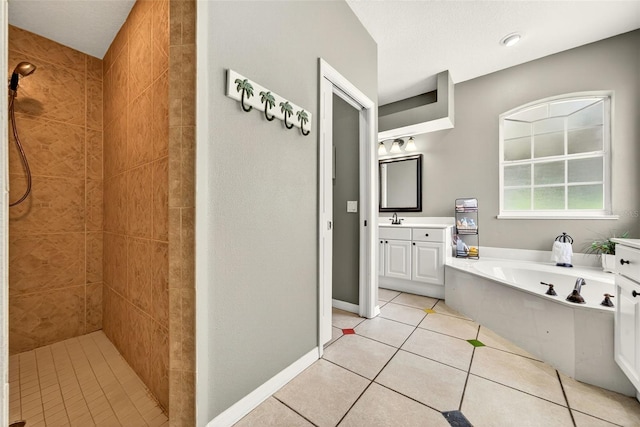 4668 73rd St E, Bradenton, FL 34203 - bathroom with tile patterned floors, vanity, a bath, and tiled shower
