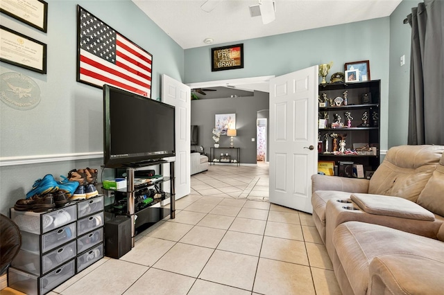 4668 73rd St E, Bradenton, FL 34203 - living area with ceiling fan and light tile patterned floors
