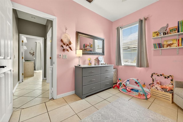 4668 73rd St E, Bradenton, FL 34203 - rec room featuring light tile patterned floors and baseboards